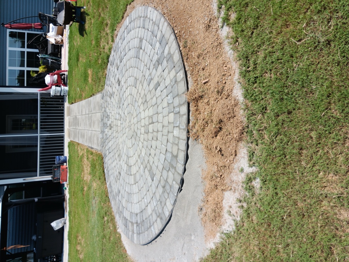 Circular paver patio installation by HRJ